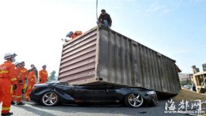 Audi S5 Squashed Under A Shipping COntainer