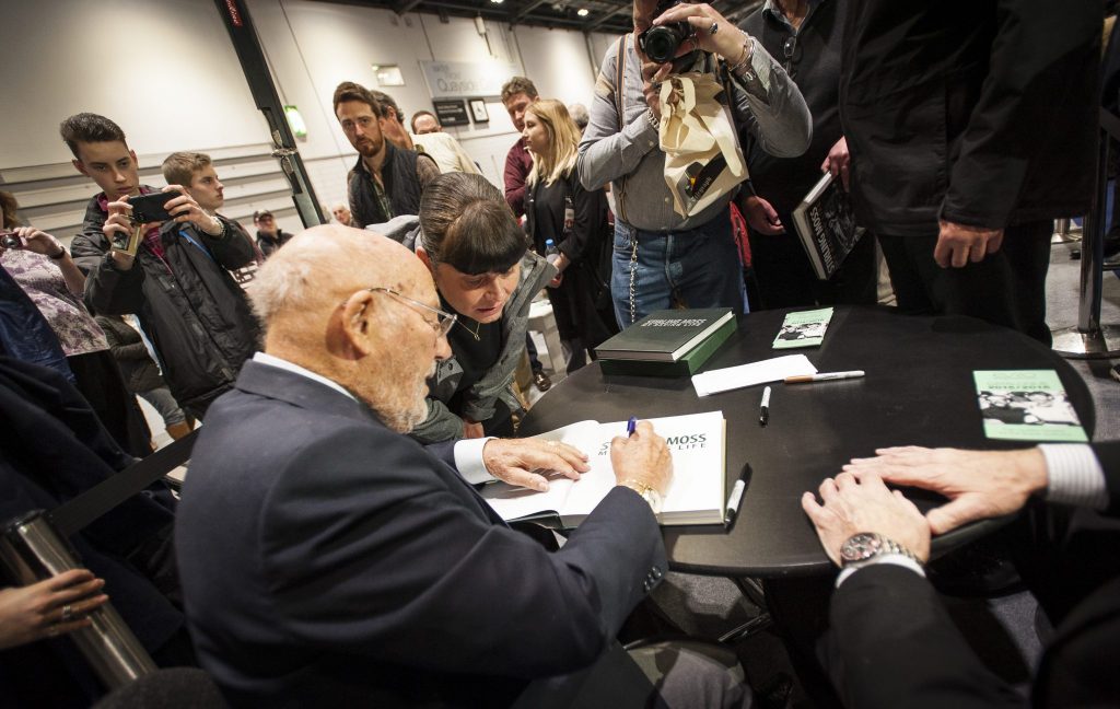 Stirling Moss signing books